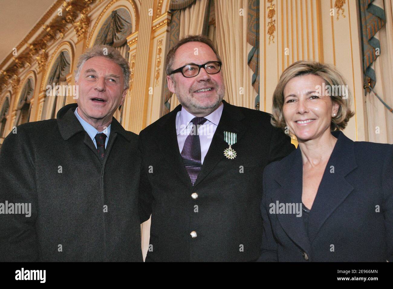 French PR Dominique Segall (c) poses with Claire Chazal and Robert Namias after receiving the 'Chevalier dans l'ordre des Arts et Lettres' medal from French culture minister Renaud Donnedieu de Vabres during a ceremony held at the ministry in Paris, France on March 17, 2006. Photo by Thierry Orban/ABACAPRESS.COM Stock Photo