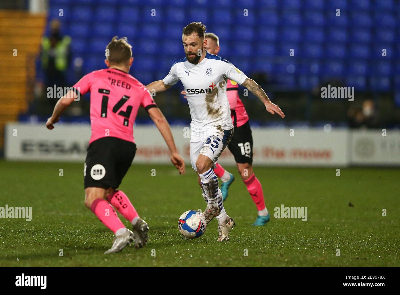 Birkenhead, UK. 02nd Feb, 2021. Danny Lloyd of Tranmere Rovers (c) looks to go past Louis Reed of Peterborough United. Papa John's trophy, EFL trophy quarter-final match, Tranmere Rovers v Peterborough Utd at Prenton Park, Birkenhead, Wirral on Tuesday 2nd February 2021. this image may only be used for Editorial purposes. Editorial use only, license required for commercial use. No use in betting, games or a single club/league/player publications.pic by Chris Stading/Andrew Orchard sports photography/Alamy Live News Credit: Andrew Orchard sports photography/Alamy Live News Stock Photo