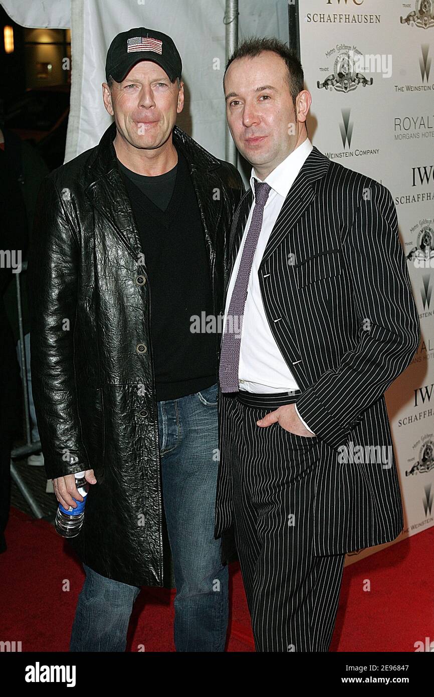 Bruce Willis and director, Paul McGuigan arrive at the premiere of 'Lucky Number Slevin' in New York, NY, USA on March 21, 2006. Photo by William Gratz/ABACAPRESS.COM Stock Photo