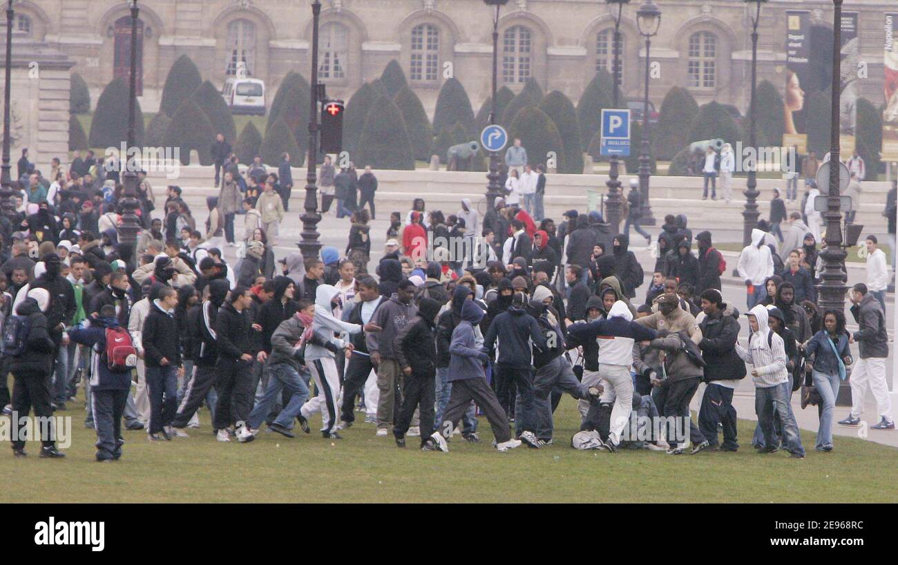 Violent riots between youg people and police forces happen apart anti-CPE students demonstration near Invalides Square in Paris, France on March 23, 2006. Photo by Taamallah-Mousse/ABACAPRESS.COM Stock Photo
