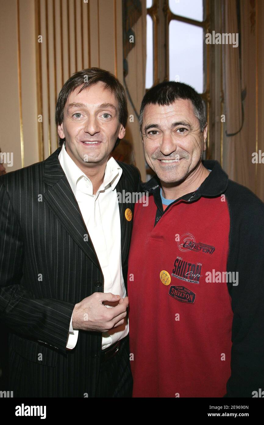 French humorists Pierre Palmade and Jean-Marie Bigard attend the ceremony  held at French minister of Culture in Paris, France on March 23, 2006, in  honor of Pierre Palmade receiving the 'Prix Raymond