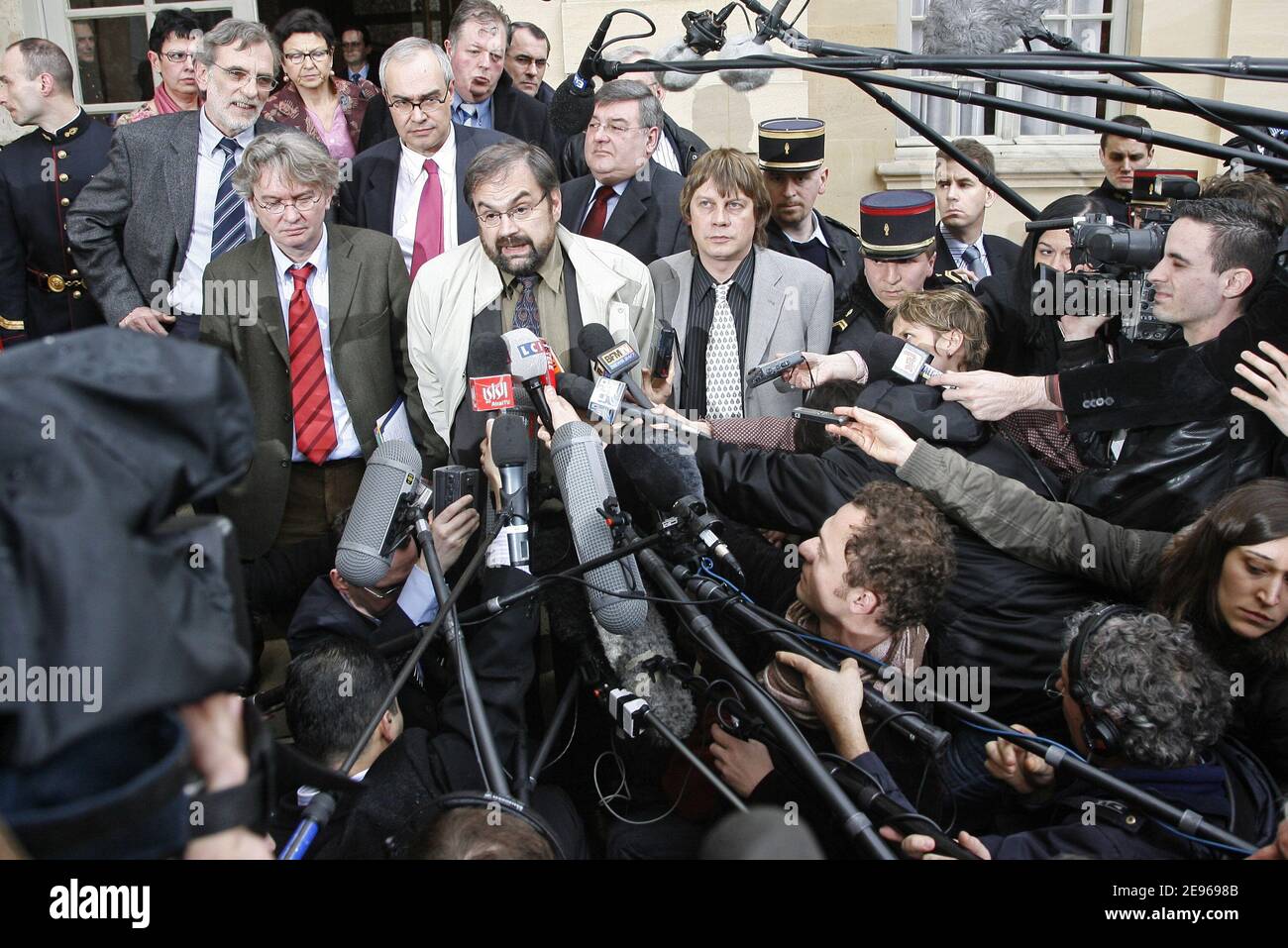 Unionists Bernard Thibault (CGT) (R), Francois Chereque (C), Jean-Claude Mailly (FO) (L), Jacques Voisin (2nd rowL) (CFTC), et Jean-Marc Icard (2nd Row C) (CFE-CGC) answer to journalists as they leave a meeting with French Prime Minister Dominique de Villepin in Paris, France, March 24, 2006. The prime minister met with unions for just over one hour, with both sides refusing to cede any ground. The unions say they will not hold talks with the government unless the law is revoked. De Villlepin has said he won't withdraw, suspend or change the law.. Photo by Mehdi Taamallah/ABACAPRESS.COM Stock Photo