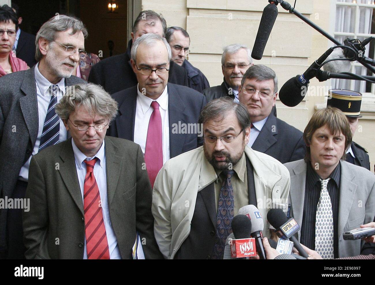 Unionists Bernard Thibault (CGT) (R), Francois Chereque (C), Jean-Claude Mailly (FO) (L), Jacques Voisin (2nd rowL) (CFTC), et Jean-Marc Icard (2nd Row C) (CFE-CGC) answer to journalists as they leave a meeting with French Prime Minister Dominique de Villepin in Paris, France, March 24, 2006. The prime minister met with unions for just over one hour, with both sides refusing to cede any ground. The unions say they will not hold talks with the government unless the law is revoked. De Villlepin has said he won't withdraw, suspend or change the law.. Photo by Mehdi Taamallah/ABACAPRESS.COM Stock Photo