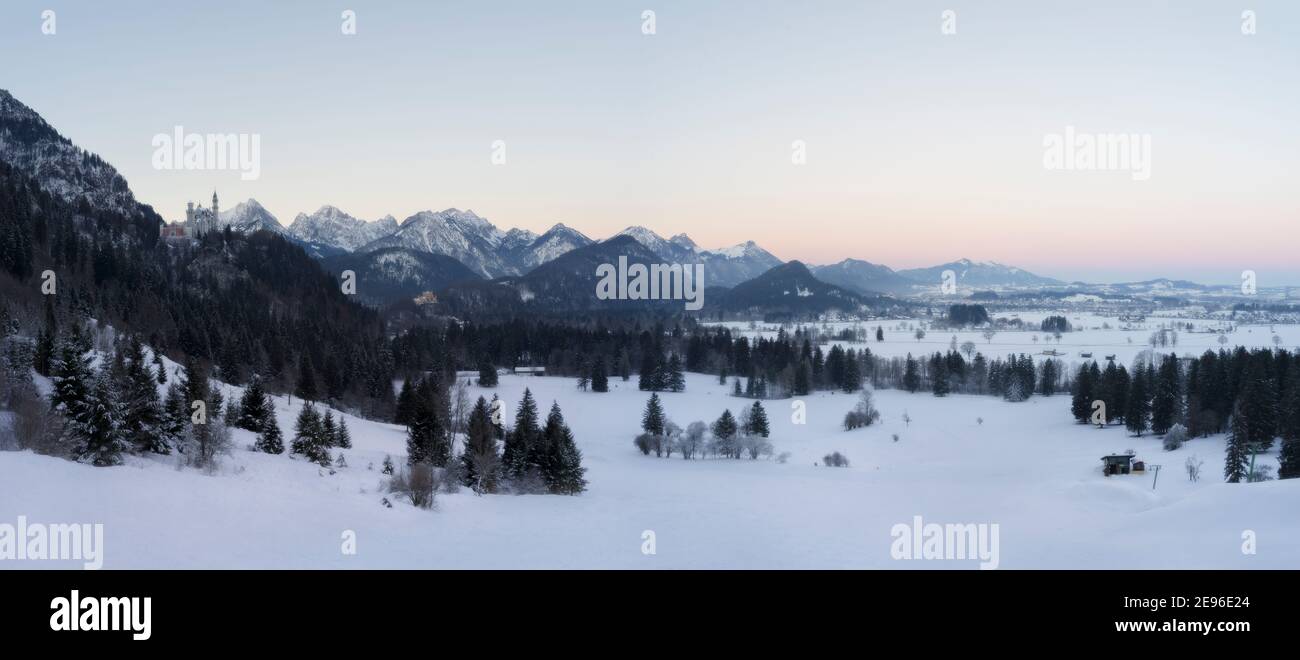Beautiful winter panorama of Neuschwanstein and Hohenschwangau castle at sunrise Stock Photo