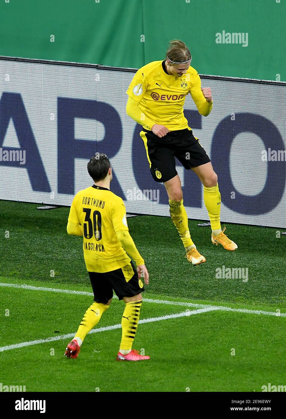 Dortmund, Germany. 02nd Feb, 2021. Football: DFB Cup, Borussia Dortmund -  SC Paderborn 07, Round of 16 at Signal Iduna Park. Dortmund's Erling  Haaland (r) celebrates with teammate Felix Passlack (l) after