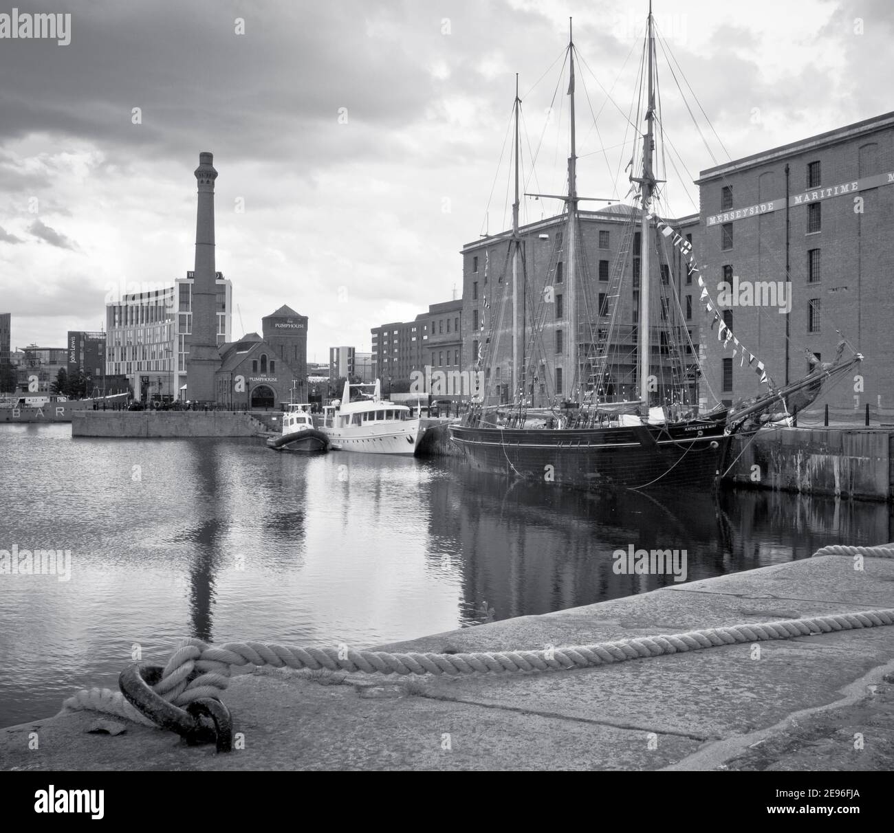 Old ships and boats at Albert Dock in Liverpool, along the River Mersey, Maritime Museum, Museum of Slavery, knowledge, tourist, tourism Stock Photo