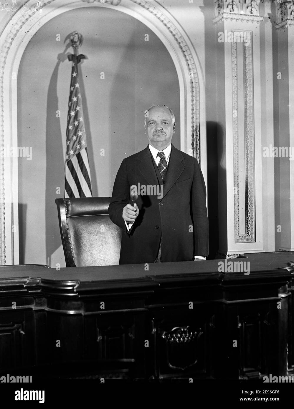 The Vice President makes ready for extra session. Vice President Curtis, standing in the ? of the Senate Chamber ready to open the extra session of the 71st Congress. Many important issues are to come up for discussion, and it is expected that will be a very busy session, 1929 Stock Photo