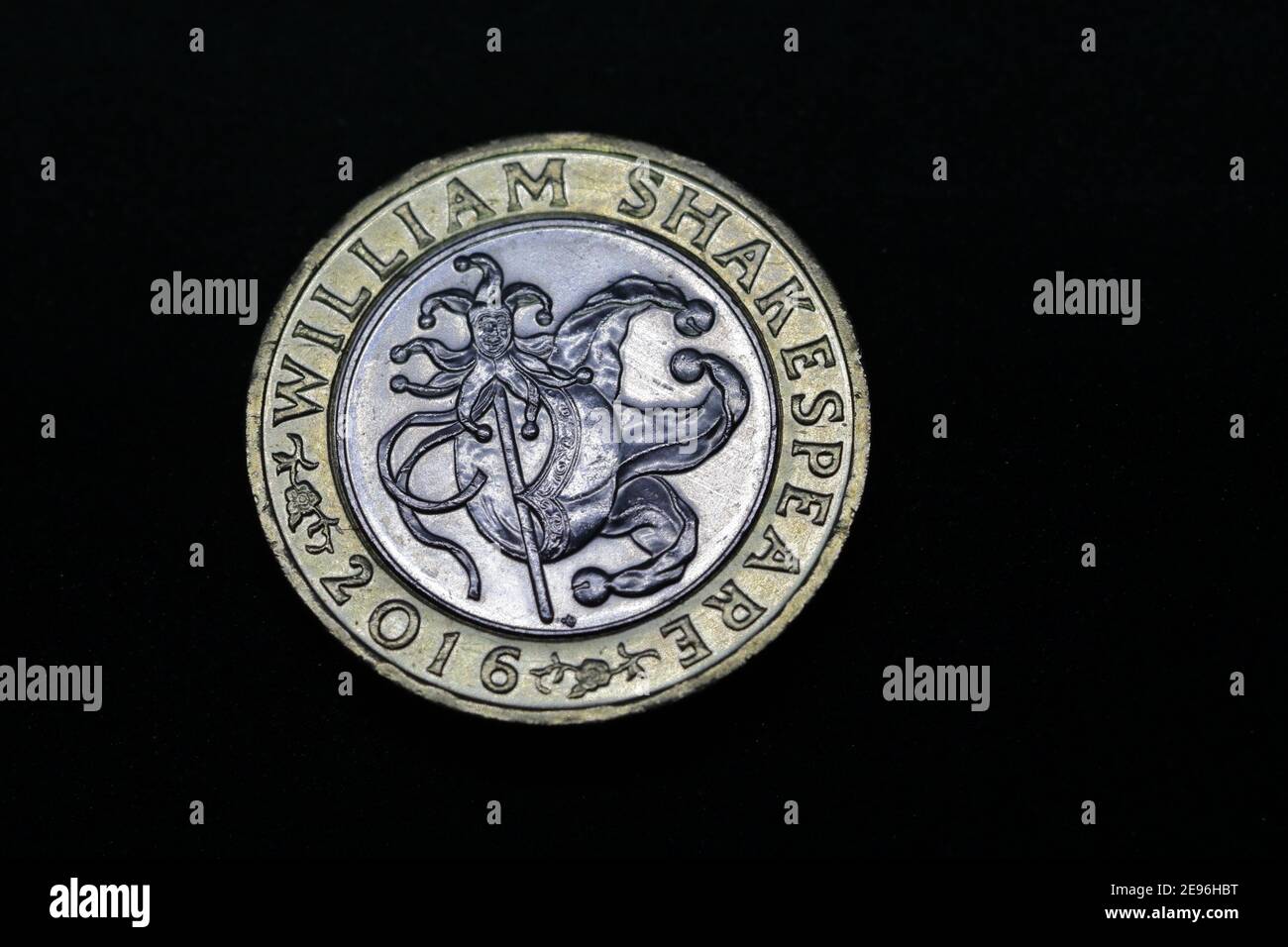 The tails side of a 2016 £2 (two pounds sterling) featuring William Shakespeare by name and an image representing theatre Stock Photo