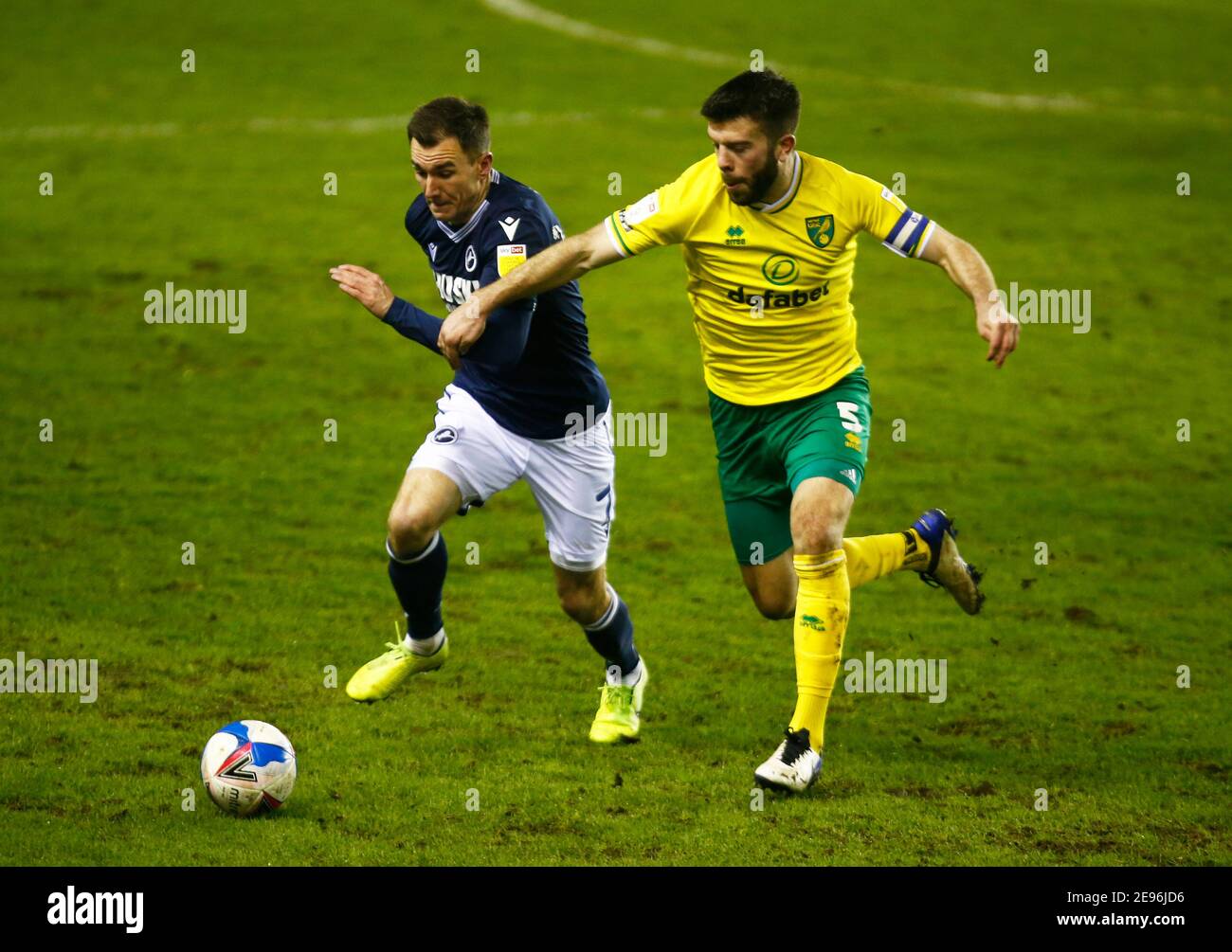 LONDON, United Kingdom, FEBRUARY 02:L-R Jed Wallace of Millwall and Norwich City's Grant Hanley during The Sky Bet Championship between Millwall and Norwich City at The Den Stadium, London on 2nd February, 2021 Credit: Action Foto Sport/Alamy Live News Stock Photo