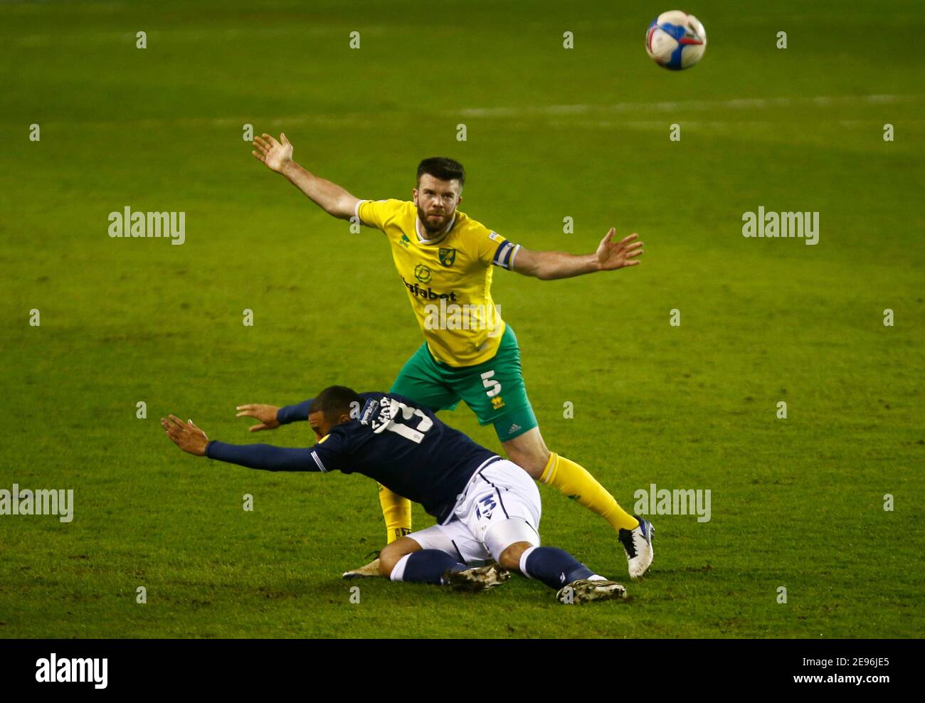 LONDON, United Kingdom, FEBRUARY 02: Kenneth Zohore of Millwall tussle with Norwich City's Grant Hanley during The Sky Bet Championship between Millwall and Norwich City at The Den Stadium, London on 2nd February, 2021 Credit: Action Foto Sport/Alamy Live News Stock Photo