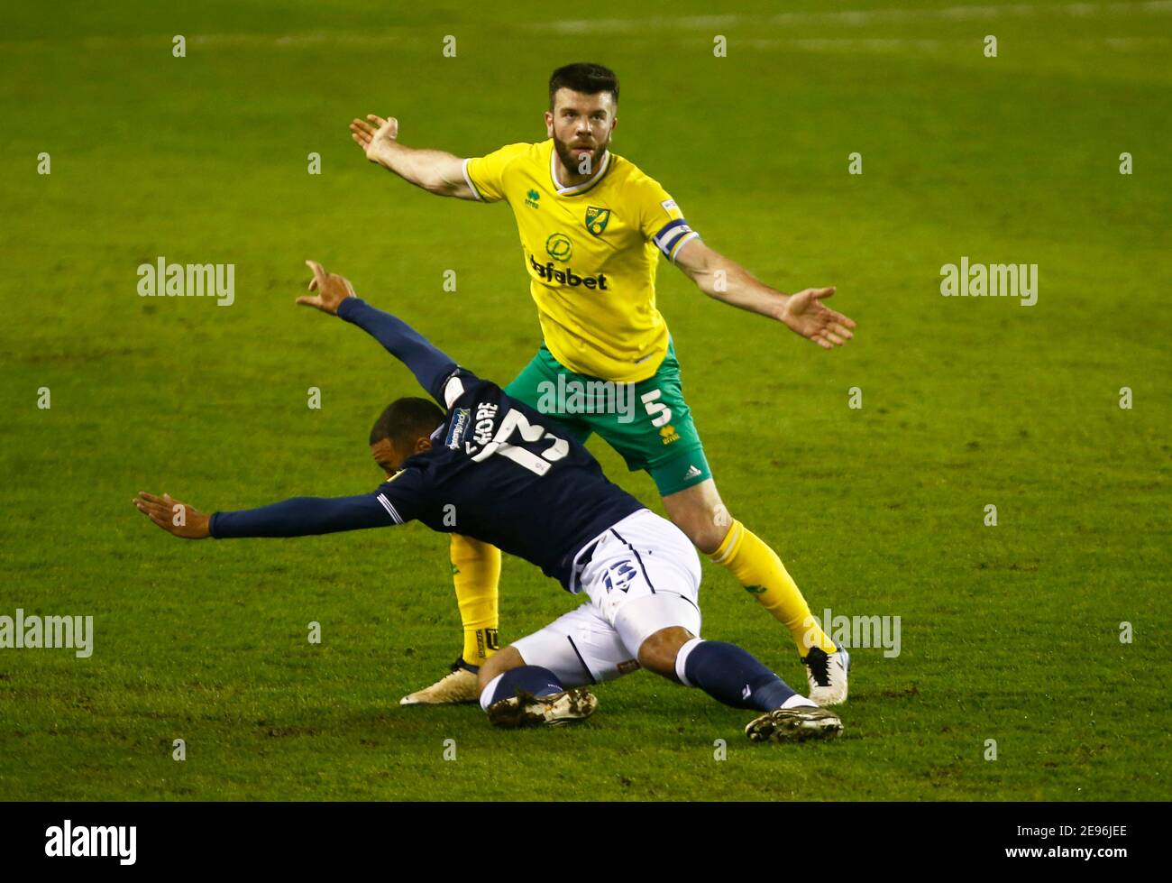 LONDON, United Kingdom, FEBRUARY 02: Kenneth Zohore of Millwall tussle with Norwich City's Grant Hanley during The Sky Bet Championship between Millwall and Norwich City at The Den Stadium, London on 2nd February, 2021 Credit: Action Foto Sport/Alamy Live News Stock Photo