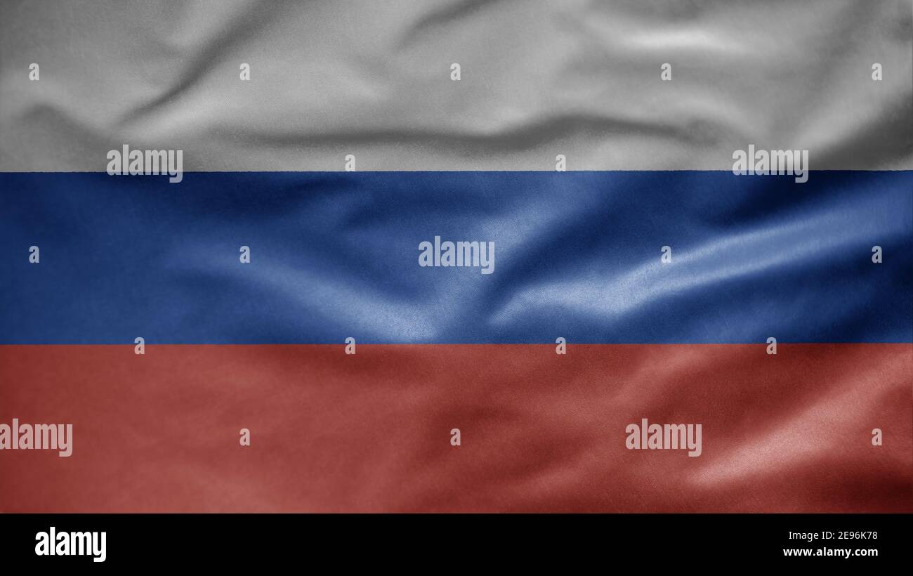 Russian flag waving in the wind. Close up of Russia banner blowing, soft and smooth silk. Cloth fabric texture ensign background. Use it for national Stock Photo