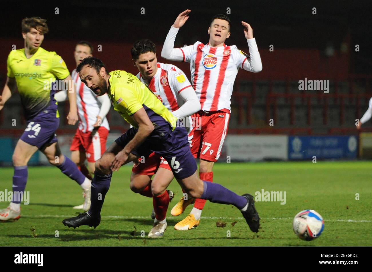 Stevenage, Hertfordshire, UK. 2nd Feb 2021. Stevenages Matt Stevens fouls Exeter Citys Rory McArdle during the Sky Bet League 2 match between Stevenage and Exeter City at the Lamex Stadium, Stevenage on Tuesday 2nd February 2021. (Credit: Ben Pooley | MI News) Credit: MI News & Sport /Alamy Live News Stock Photo