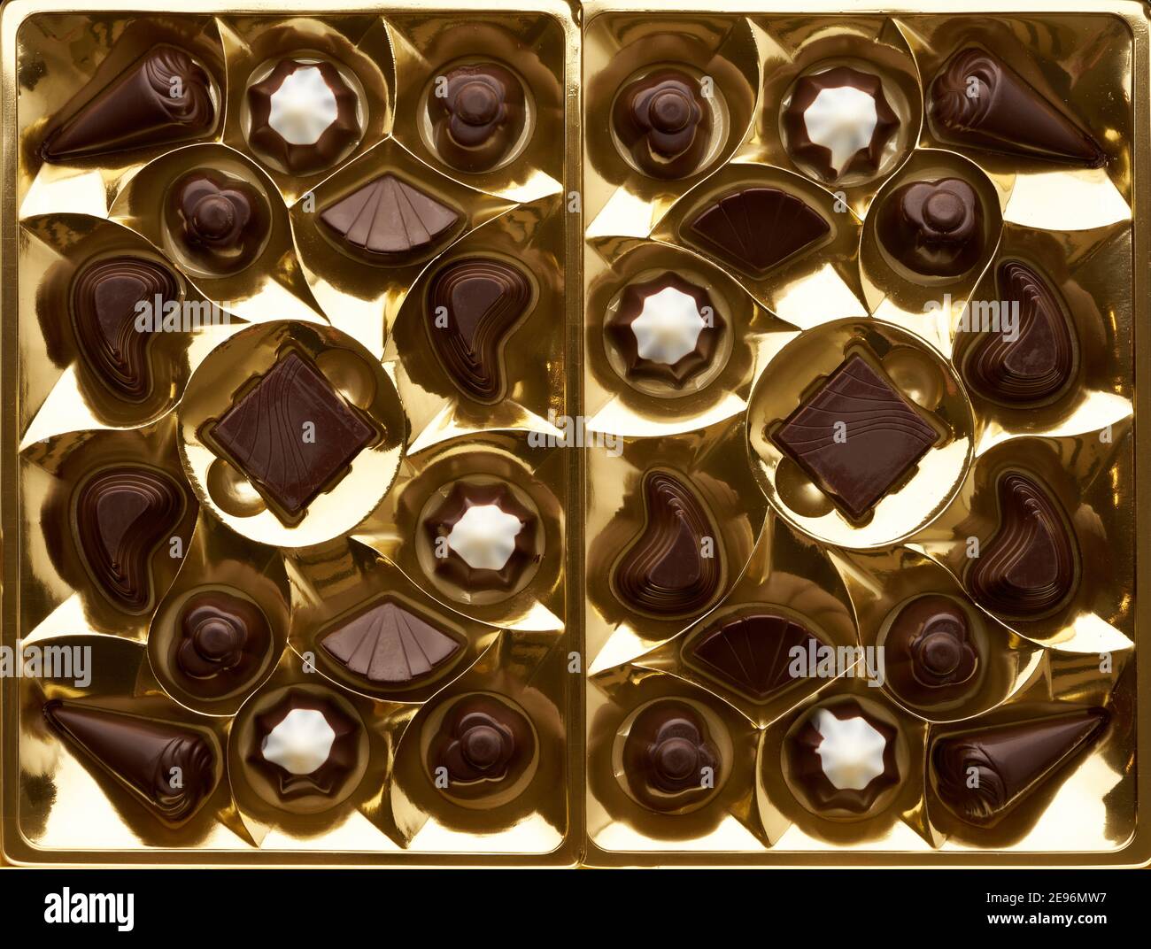 Several assorted chocolates in a yellow packing box Stock Photo Alamy