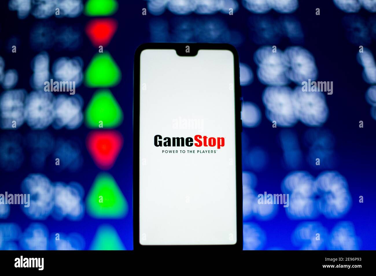 In this photo illustration a GameStop logo is seen displayed on a ...