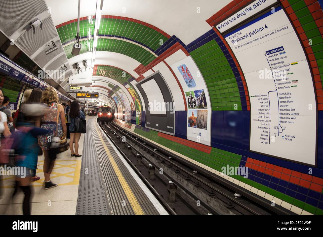 The Tube, London, station, underground, transport, Piccadilly Line, Piccadilly Circus, westbound, platform 4, zone 1, to Heathrow, commuters Stock Photo