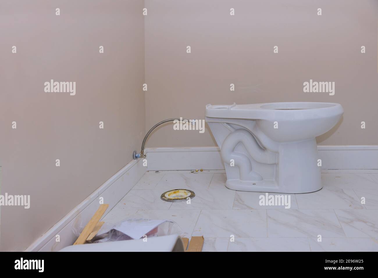 Plumber repair installation service assemble toilet bowl seat in restroom Stock Photo Alamy
