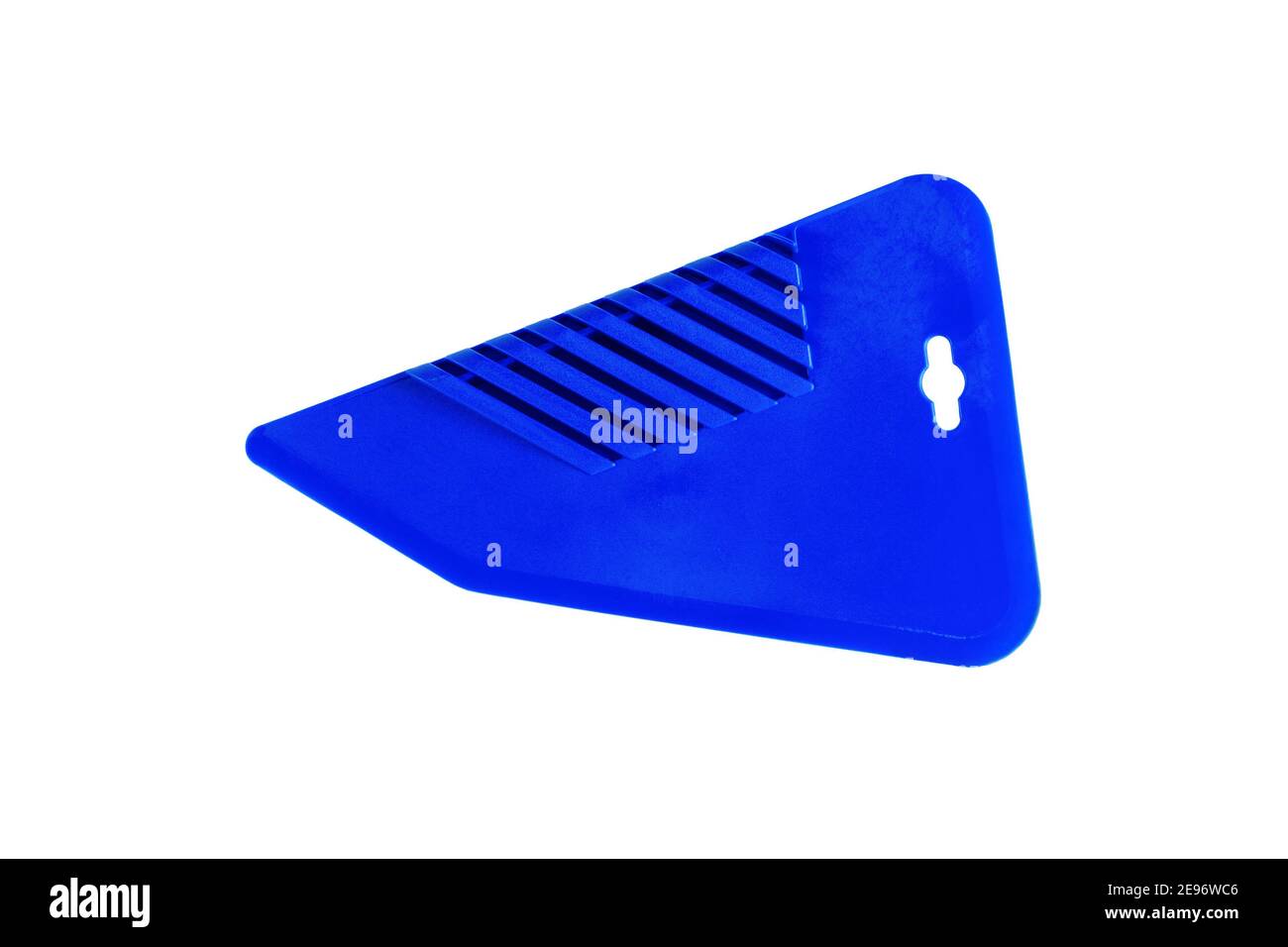 Blue plastic spatula for wallpaper. Closeup. Isolated on white