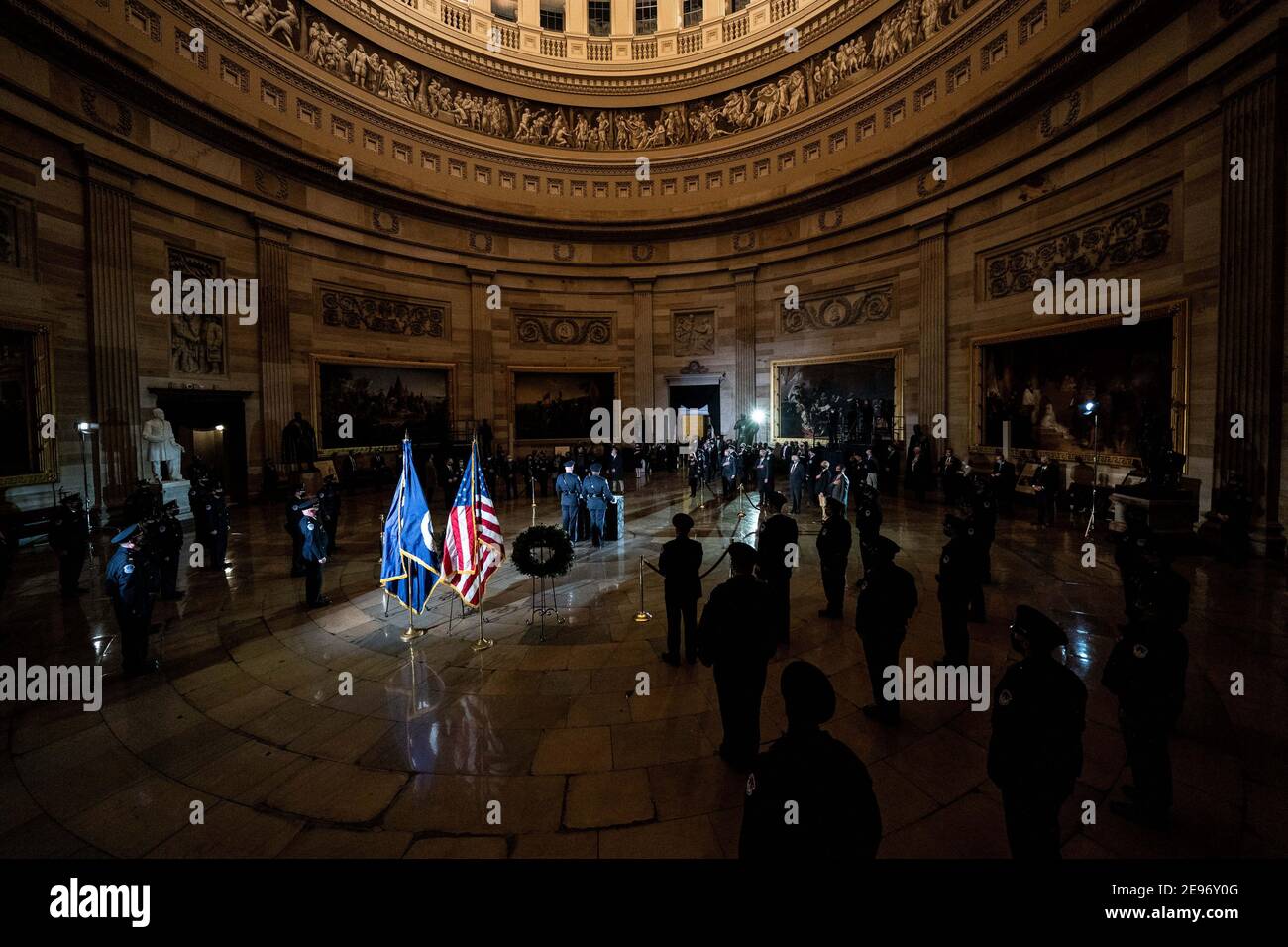 Washington, United States. 02nd Feb, 2021. Members of the Capitol Police prepare for the arrival of the late Capitol Police Officer Brian Sicknick's remains in the Capitol in Washington, DC on Tuesday, February 2, 2021. Officer Sicknick will lie in honor in the Rotunda of the Capitol. Officer Sicknick died on January 7th after engaging with rioters on January 6th while protecting the Capitol. Pool photo by Erin Schaff/UPI Credit: UPI/Alamy Live News Stock Photo
