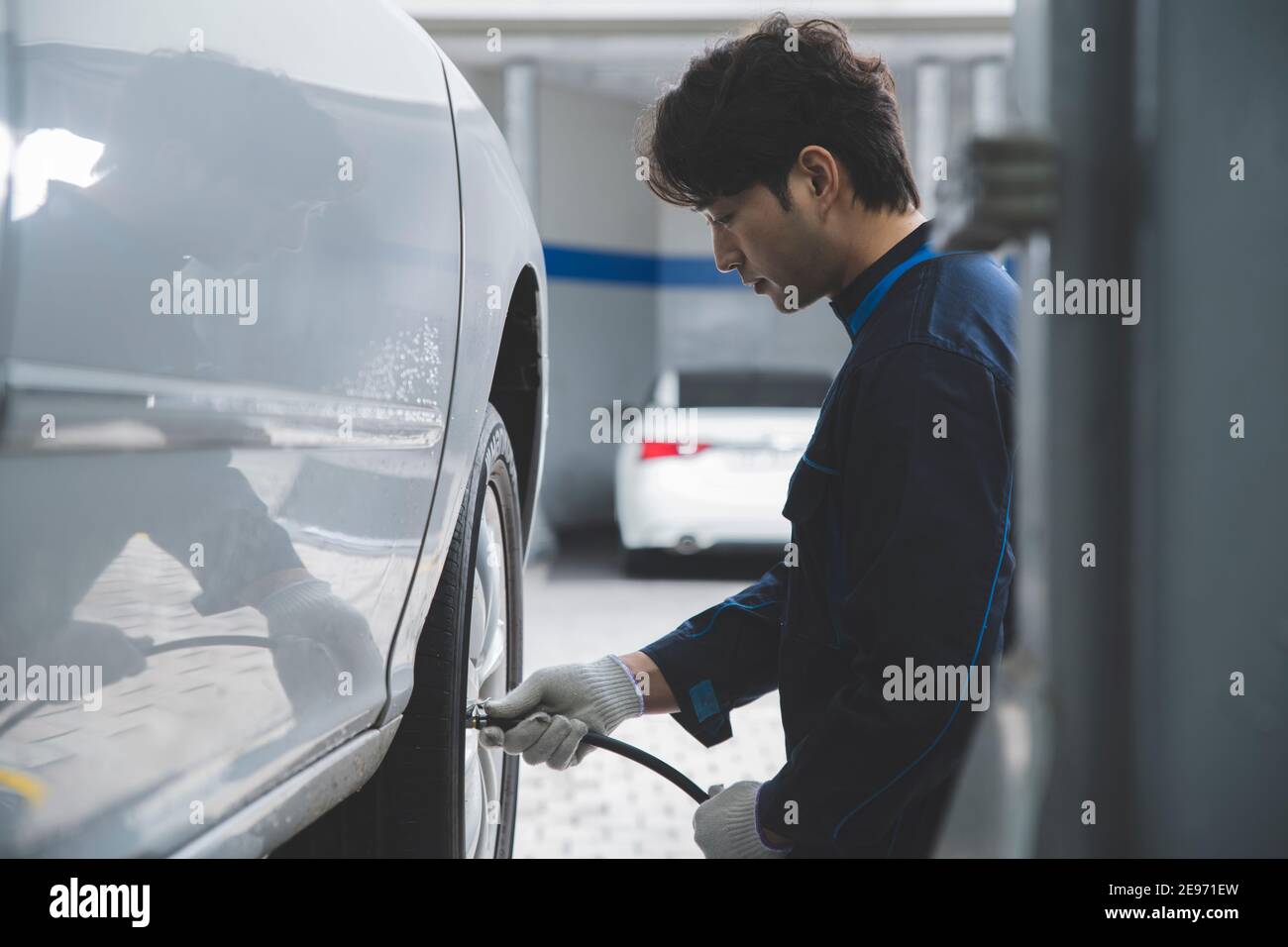 auto vehicle Service repair center concept with maintenance staff Stock Photo Alamy