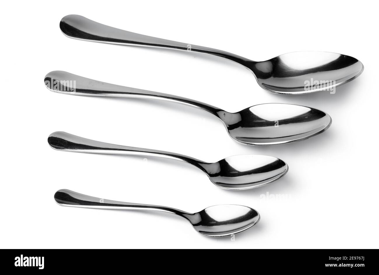 Set of silver spoons cutlery isolated on white Stock Photo Alamy