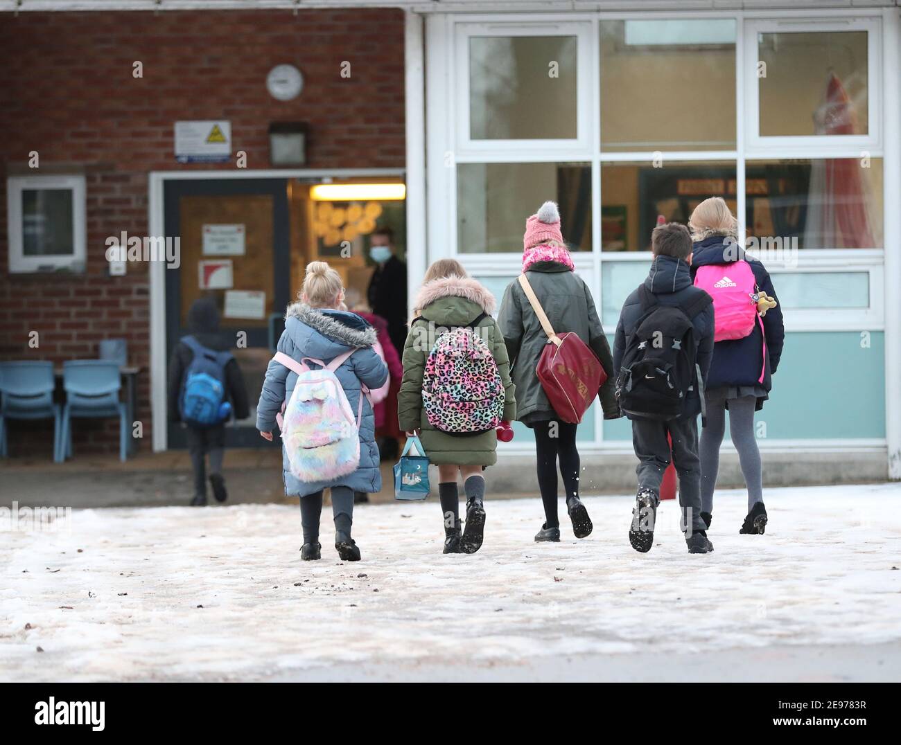 Nursery children arriving school hires stock photography and images
