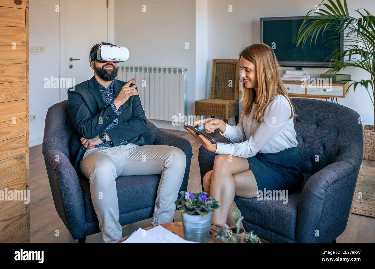 Using virtual reality headset tablet hi res stock photography and