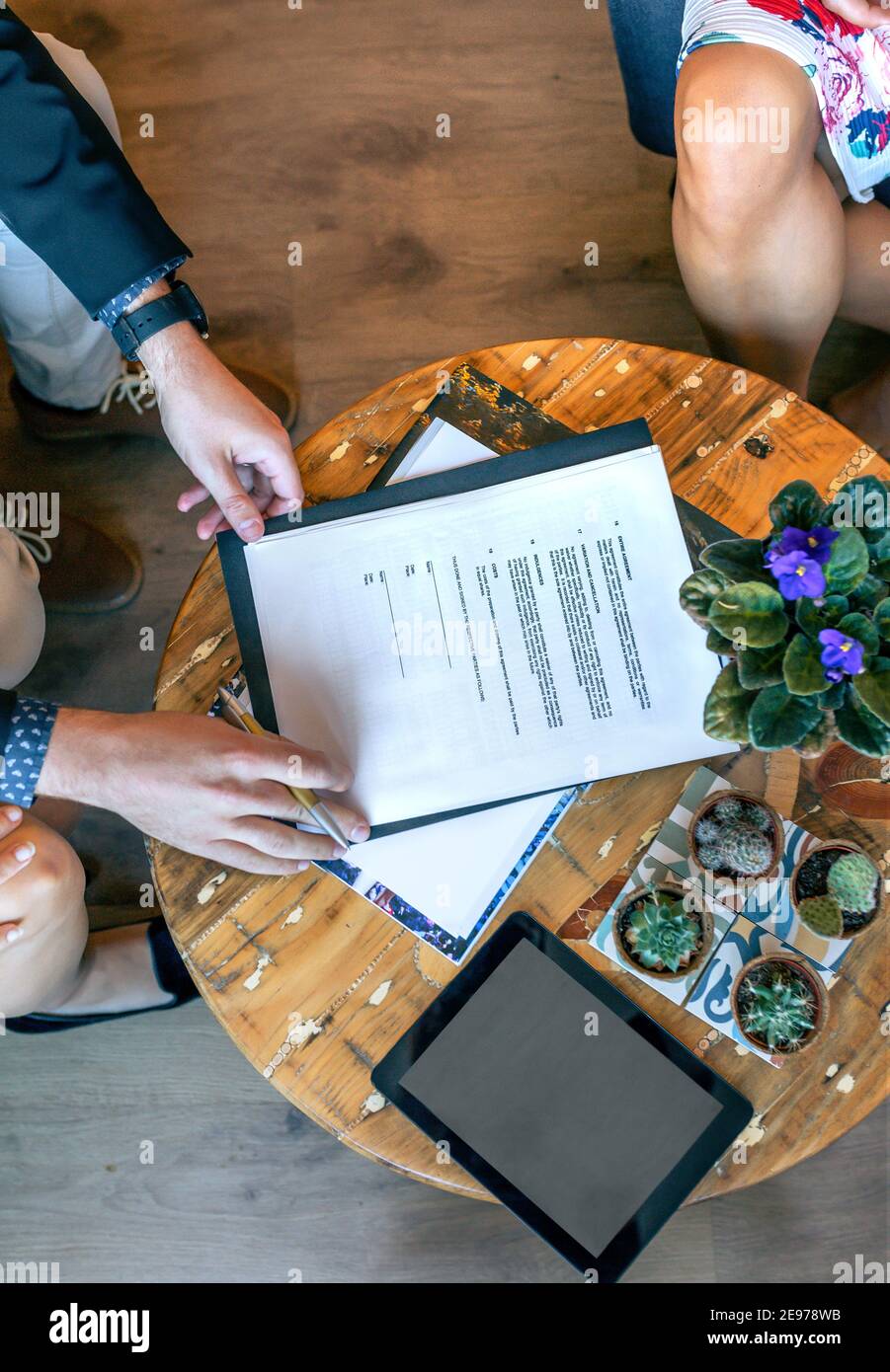 Top view of man ready to sign a document Stock Photo