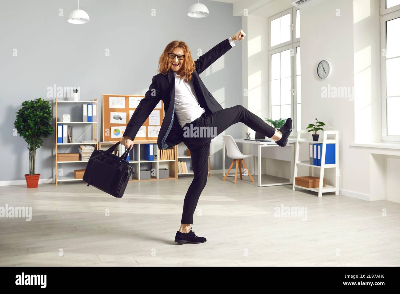 Happy Employee With Briefcase Having Fun As It S Time To Leave Office And Go Home Stock Photo Alamy Happy Employee With Briefcase Having Fun As It S Time To Leave Office And Go Home Stock Photo Alamy