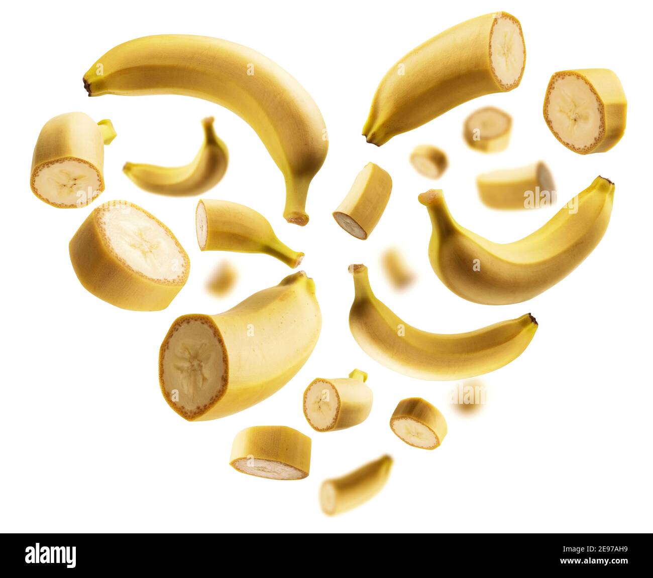 Whole and cut bananas in the shape of a heart on a white background Stock Photo Alamy