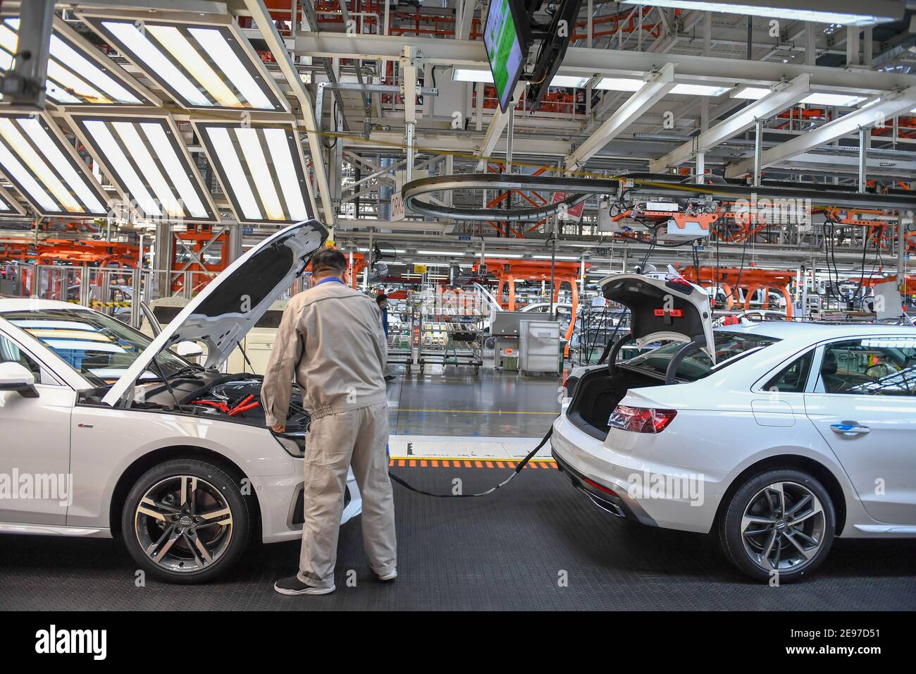 Changchun, China's Jilin Province. 5th Jan, 2021. A worker operates at the general assembly workshop of the Changchun production base under the FAW-Volkswagen Automotive Co., Ltd. (FAW-VW) in Changchun, northeast China's Jilin Province, Jan. 5, 2021. Recent data released by FAW-VW showed that the company sold 241,587 complete vehicles (including imported Audi cars) in January this year, a year-on-year growth of 27.7 percent. Credit: Zhang Nan/Xinhua/Alamy Live News Stock Photo