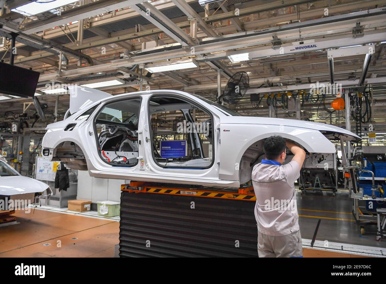 Changchun, China's Jilin Province. 5th Jan, 2021. Workers operate at the general assembly workshop of the Changchun production base under the FAW-Volkswagen Automotive Co., Ltd. (FAW-VW) in Changchun, northeast China's Jilin Province, Jan. 5, 2021. Recent data released by FAW-VW showed that the company sold 241,587 complete vehicles (including imported Audi cars) in January this year, a year-on-year growth of 27.7 percent. Credit: Zhang Nan/Xinhua/Alamy Live News Stock Photo