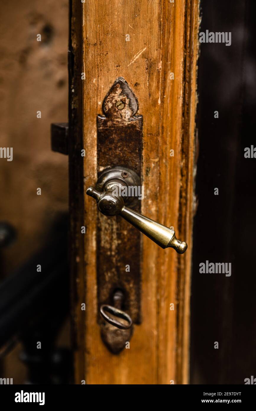 ajar antique old door close up Stock Photo