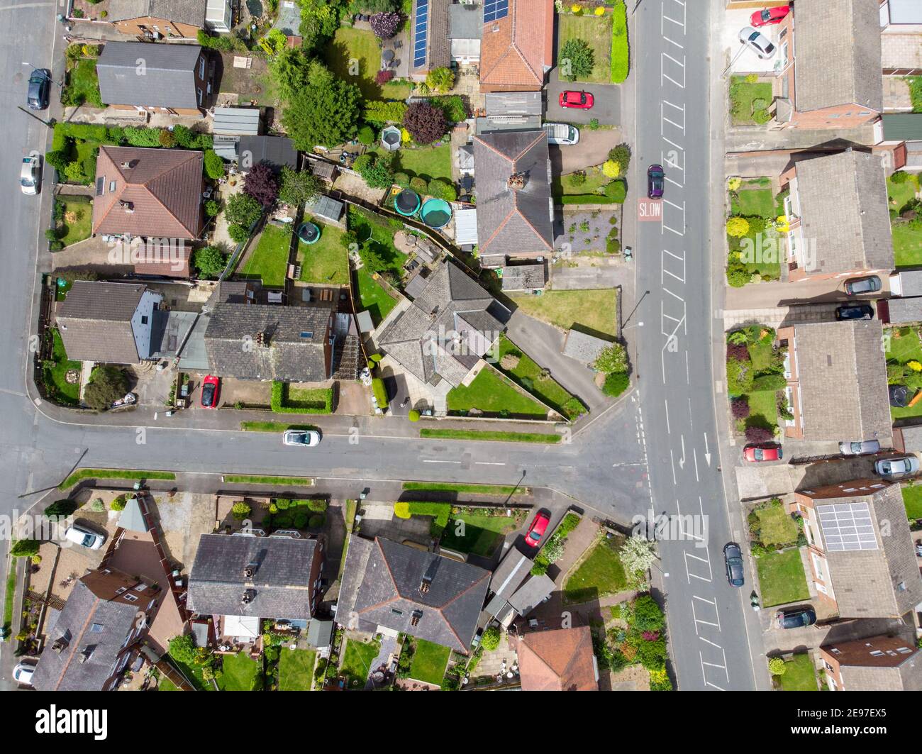 Aerial photo of the town of Batley in Yorkshire UK, showing a typical British housing estates with roads and streets, taken with a drone on a sunny da Stock Photo