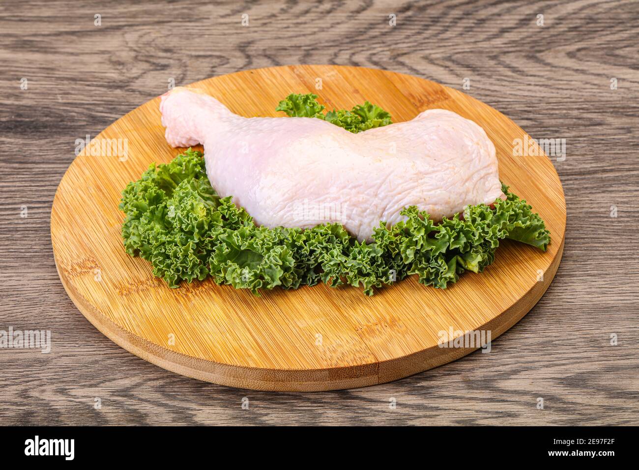 Raw uncooked chicken leg for cooking Stock Photo Alamy