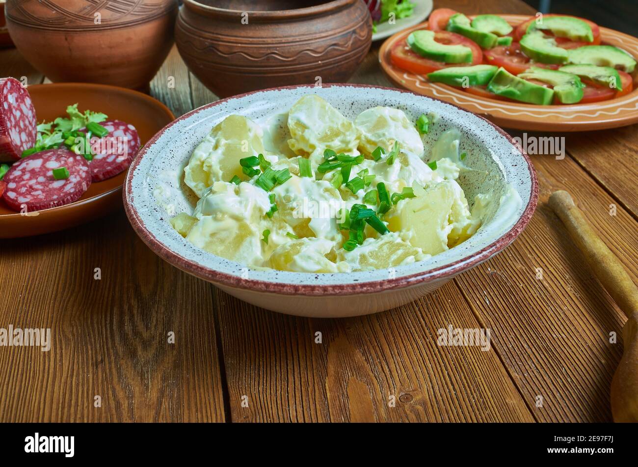 Irish Potato Salad, Cut and steam the potatoes until tender Stock Photo