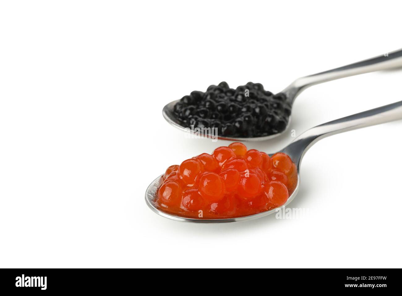 Spoons with black and red caviar isolated on white background Stock