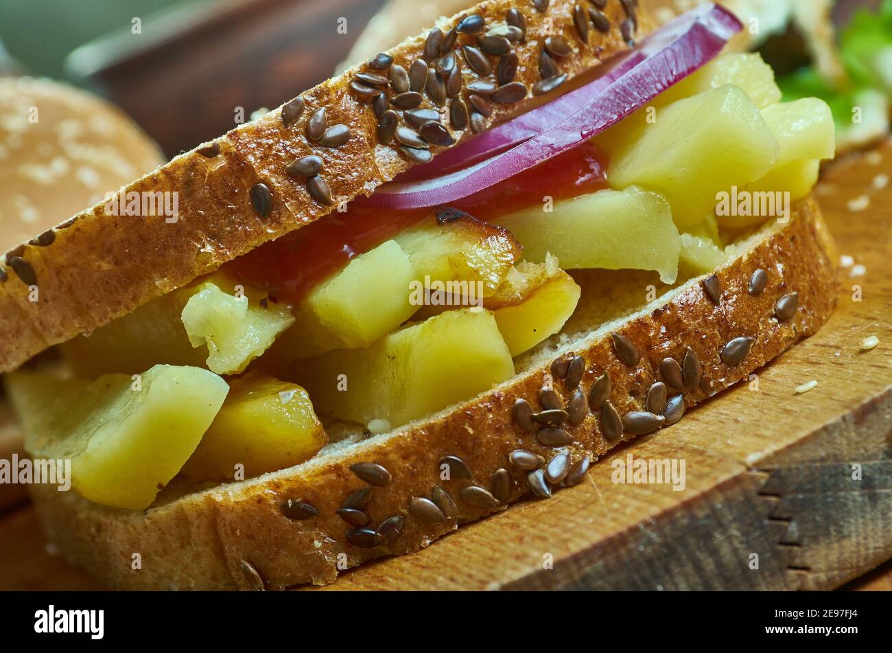 Chip Butty sandwich filled with chips, British sandwiches Stock Photo