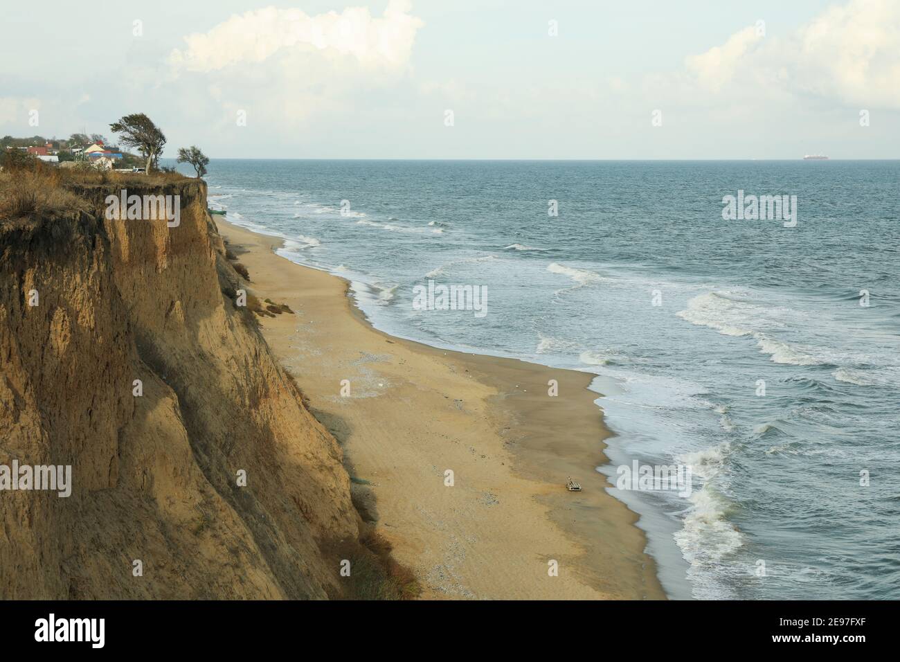 Sea with waves on beautiful sandy beach Stock Photo