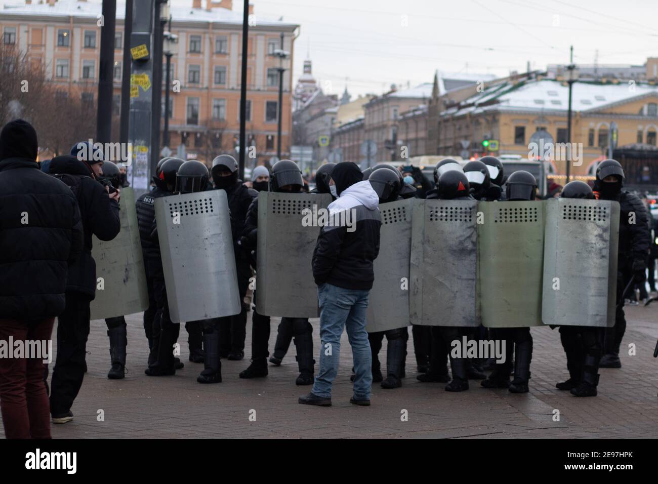 Saint Petersburg, Russia - 31 January 2021: The police surrounded the man on the street, Illustrative Editorial Stock Photo