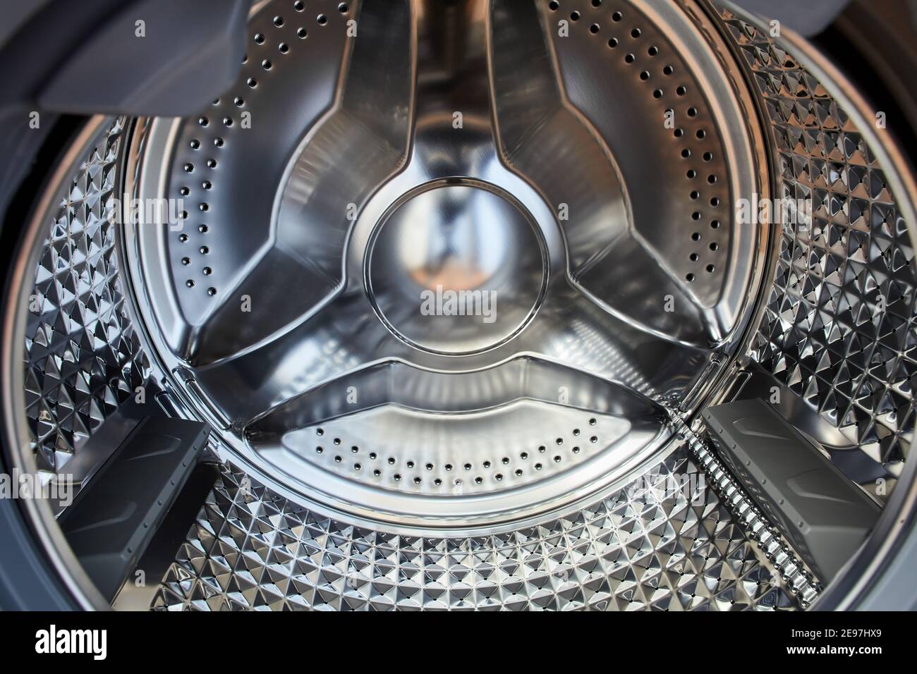Empty drum of front loading washing machine Stock Photo Alamy