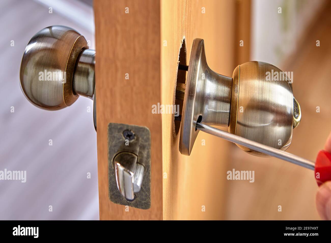 Brass door knob assembly with latch and lock Stock Photo Alamy