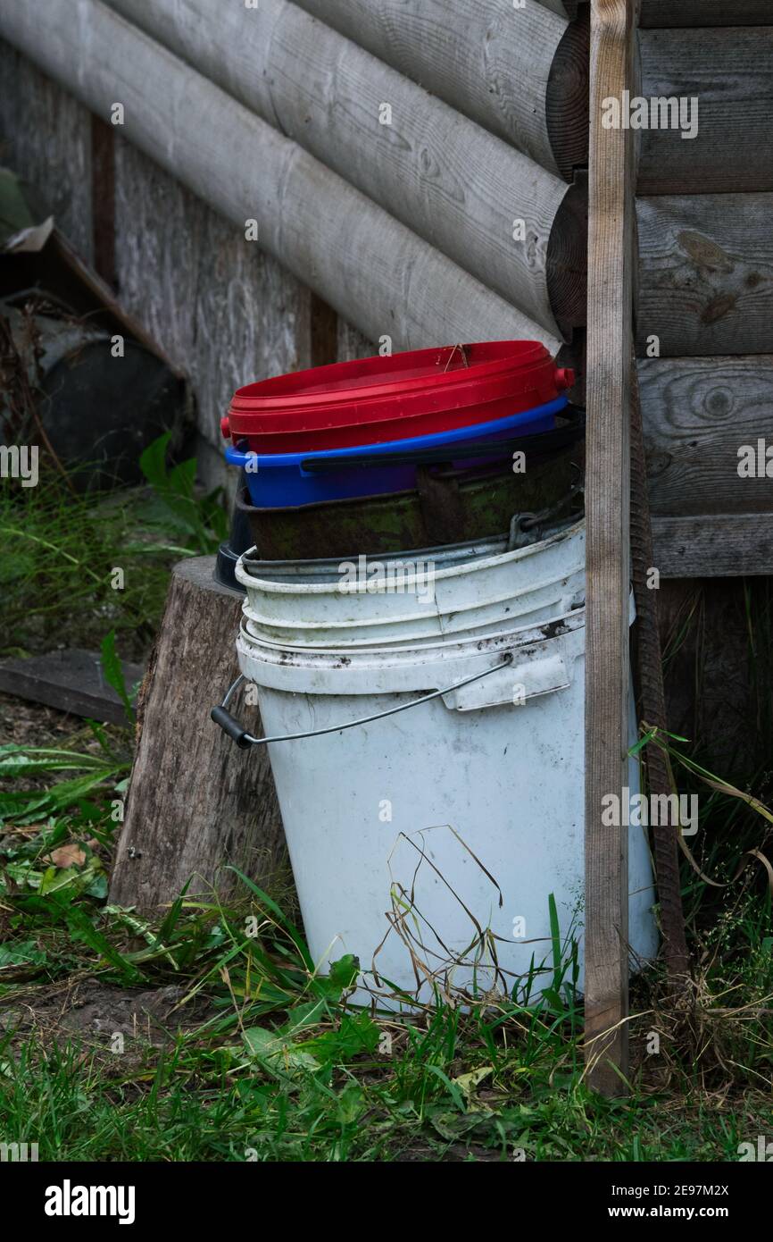 Pile of buckets. Bucket in bucket. Old buckets Stock Photo Alamy