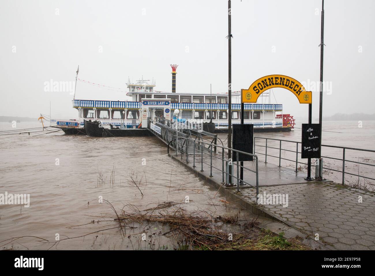 flood of the river Rhine in Wesel on the Lower Rhine on 2 February 2021, the River Lady excursion boat at the jetty, North Rhine-Westphalia, Germany. Stock Photo