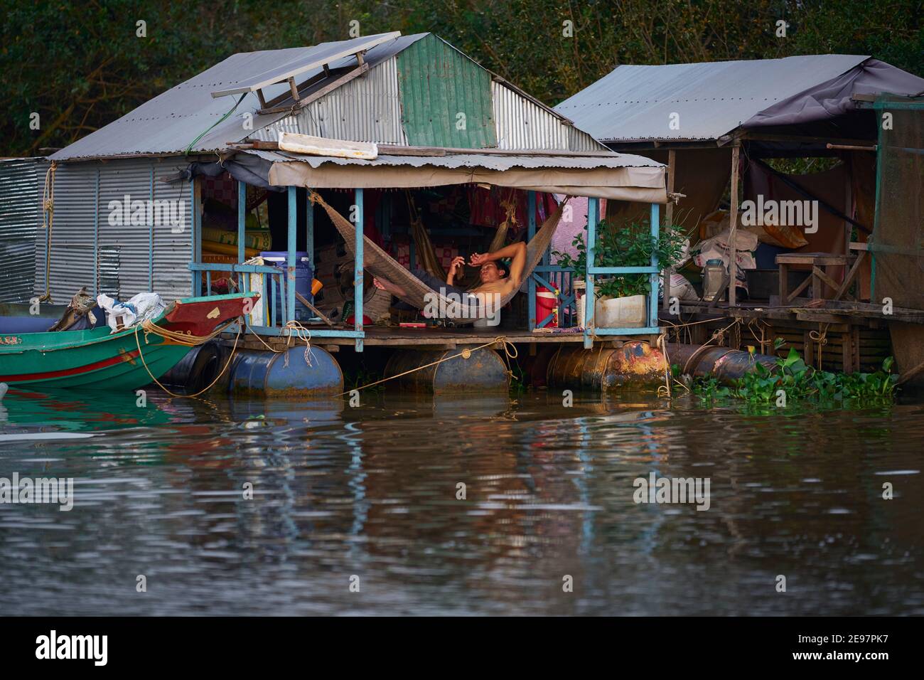 Exploring the floating village of Tonlé Sap lake which is mainly inhabited by Vietnamese. Stock Photo