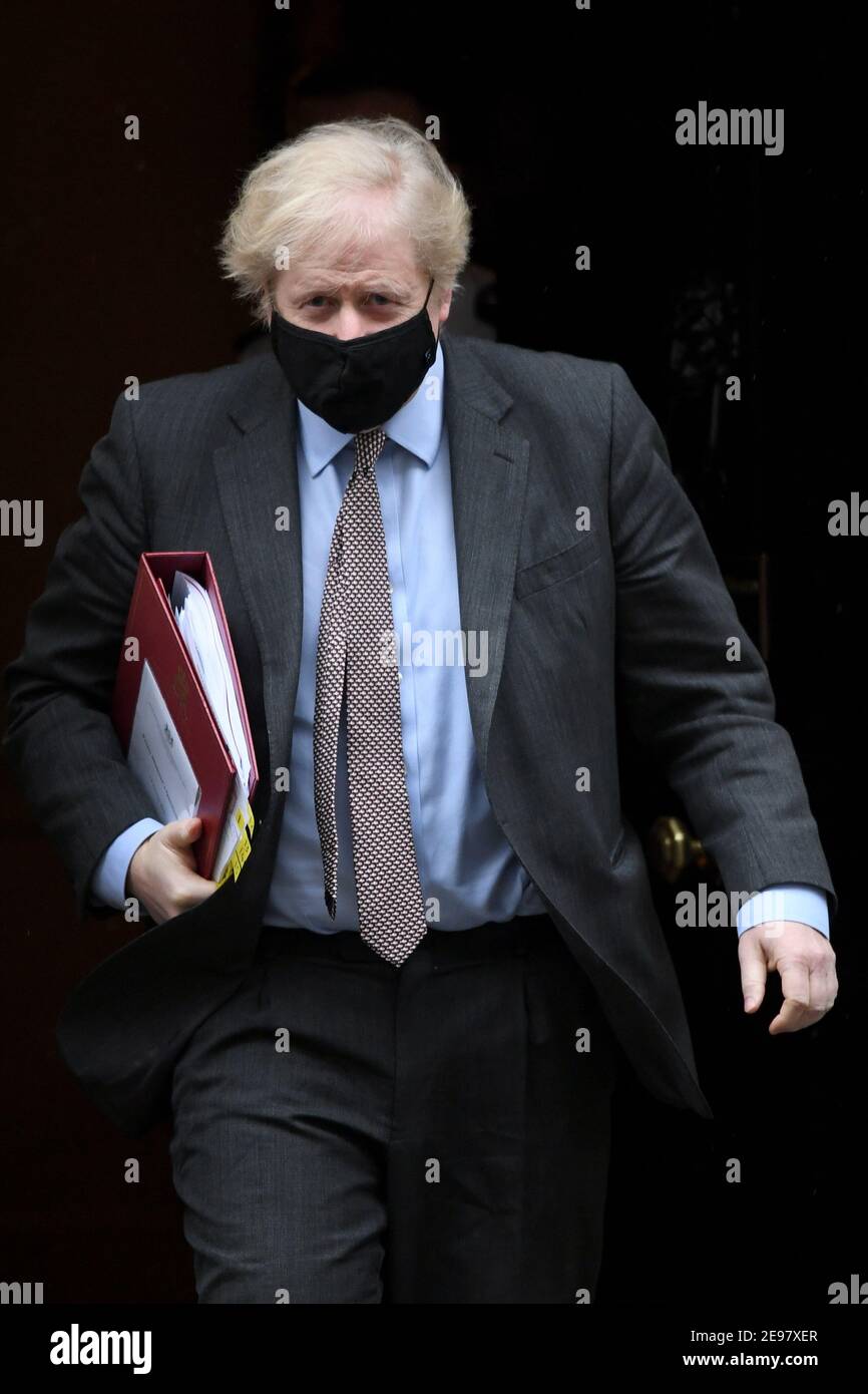 Prime Minister Boris Johnson leaves 10 Downing Street to attend Prime Minister's Questions at the Houses of Parliament, London. Picture date: Wednesday February 3, 2021. Stock Photo