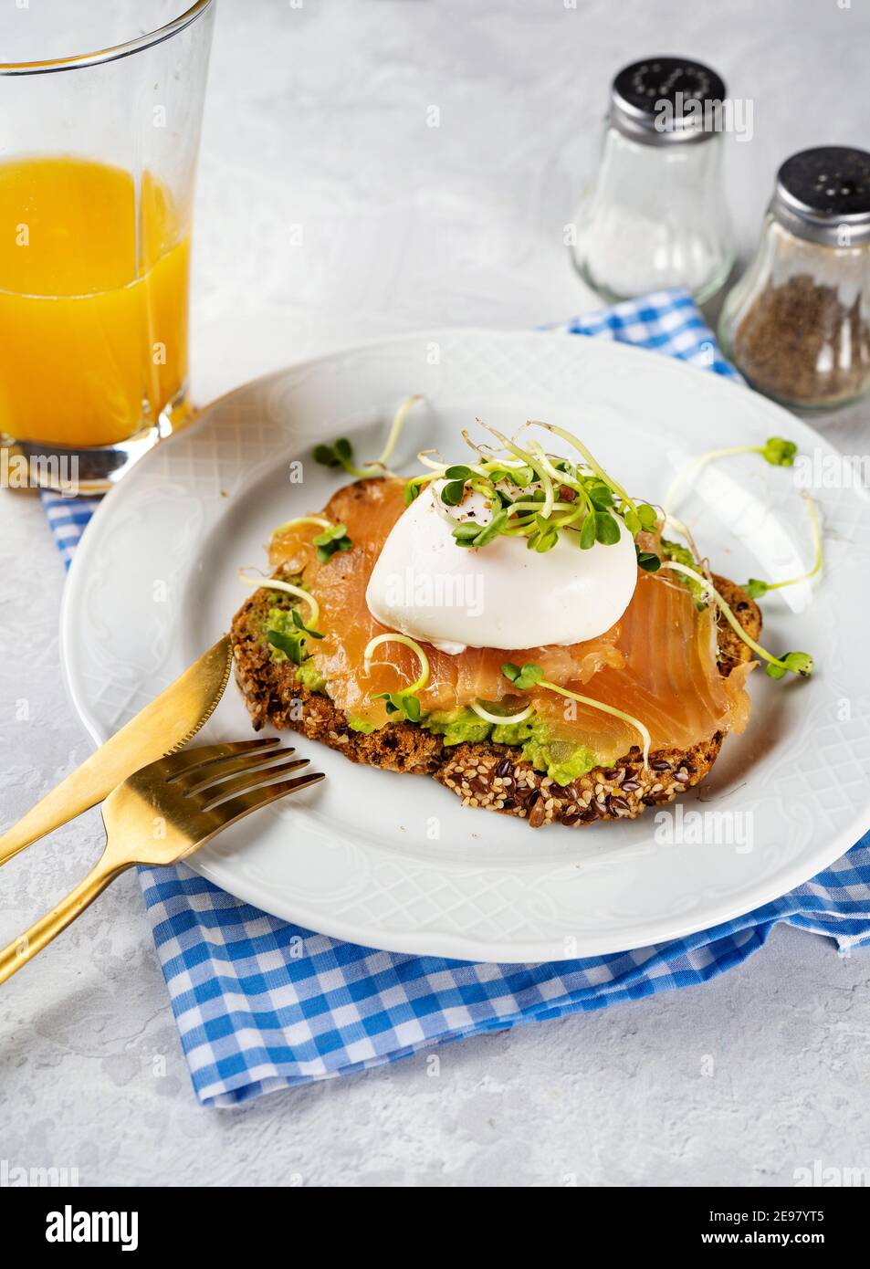 Breakfast toast with salmon and poached egg Stock Photo
