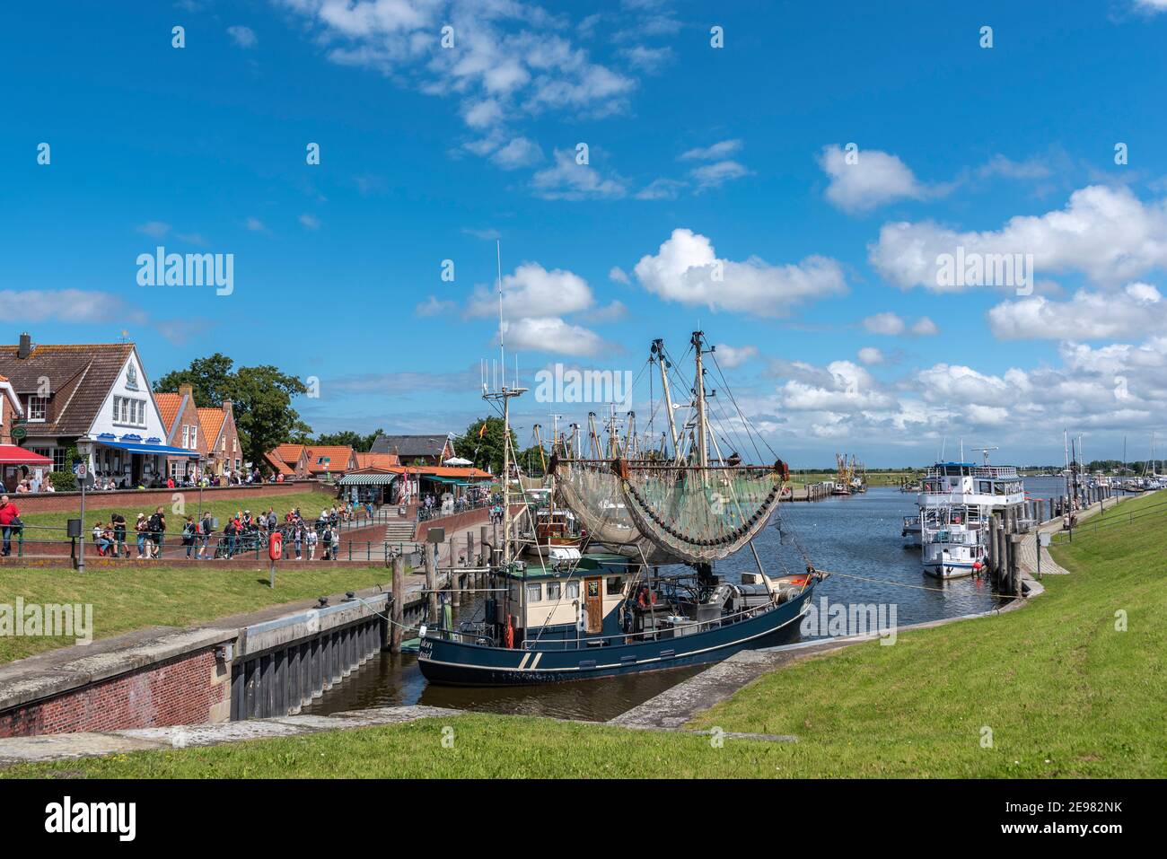 Fishing boats and shrimp boats in the fishing port, Greetsiel, Lower Saxony, Germany, Europe Stock Photo