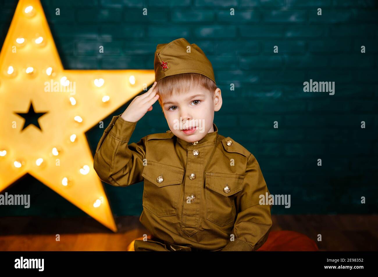 Young soldier. Little patriot. Army thee kid. Boy playing soldier Stock