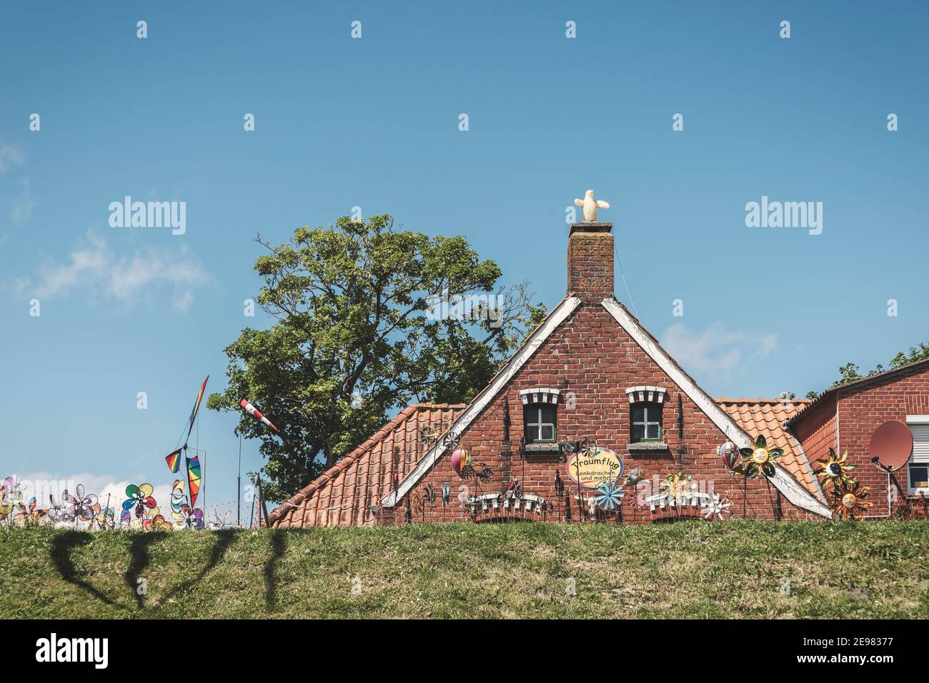 traditional Houses in Harbor of Greetsiel in East Frisia at North Sea,lower Saxony,Germany Stock Photo